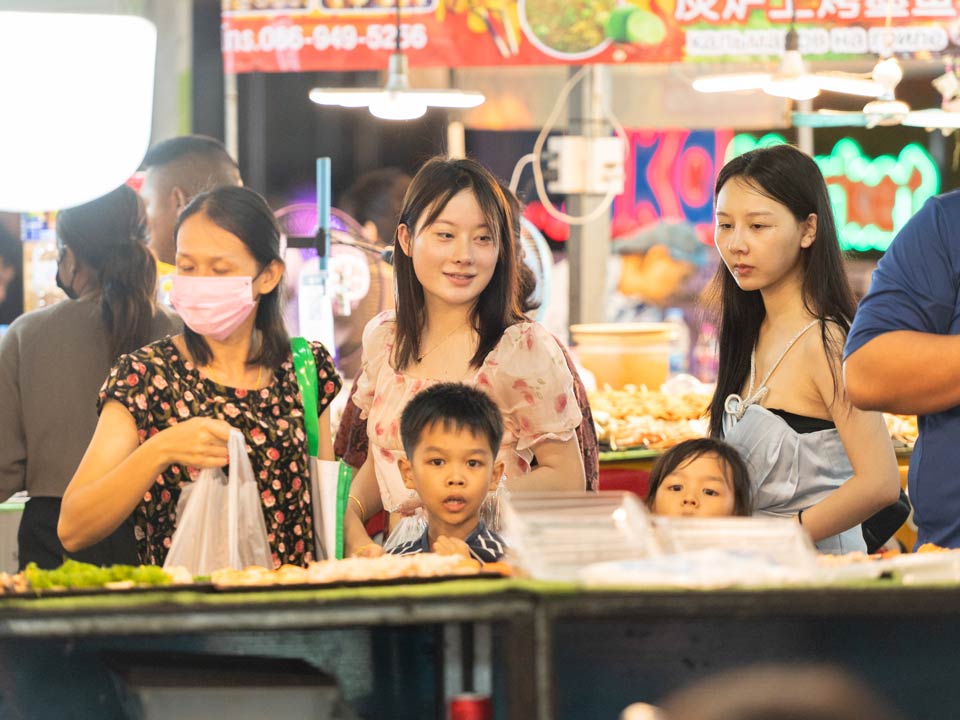 Families love the food at Naka Weekend Market
