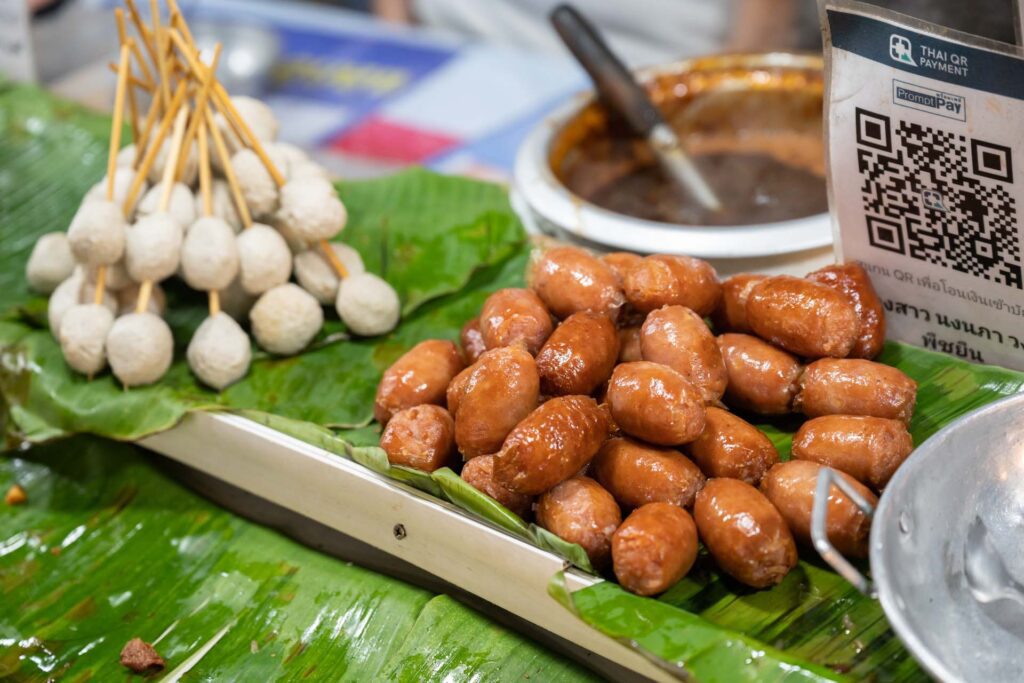 Savoury bites with spicy dipping sauce at Naka Weekend Market